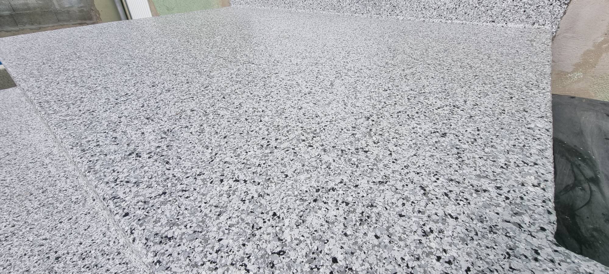 Comment installer un tapis de pierres décoratif pour sublimer une entrée ? Fegersheim
